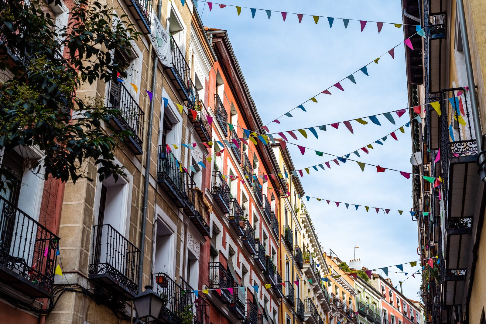 Street adorned with flags multiple colors